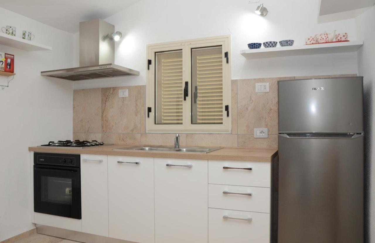 Apartments Villa Corrias Cala Liberotto Extérieur photo